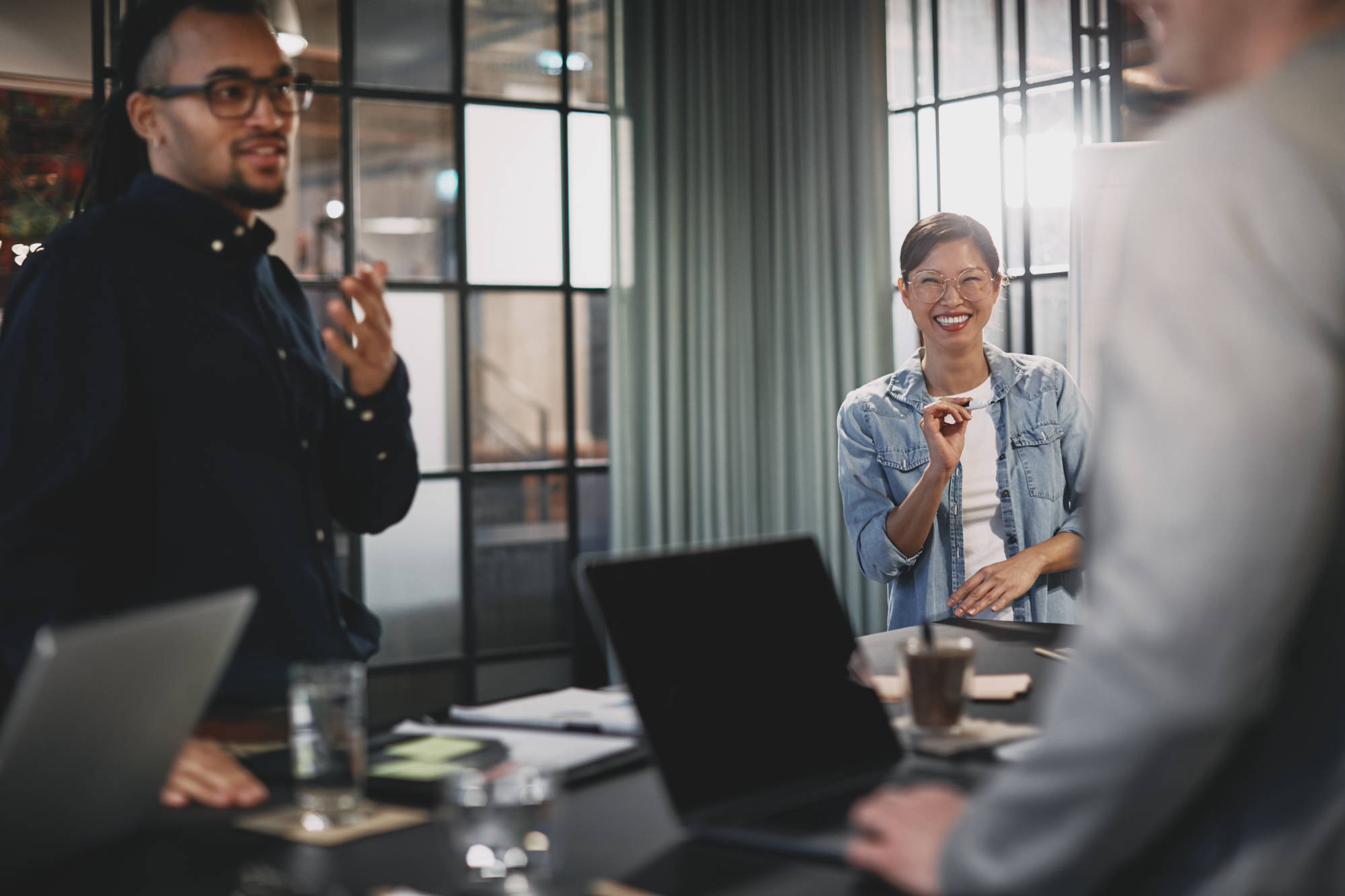 diverse_team_members_discussing_technology